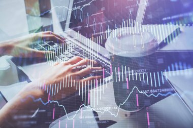 Bilgisayarda ve ön x grafik hologram çiziminde kadın eli yazarken çift pozlama. Borsa yatırım kavramı.