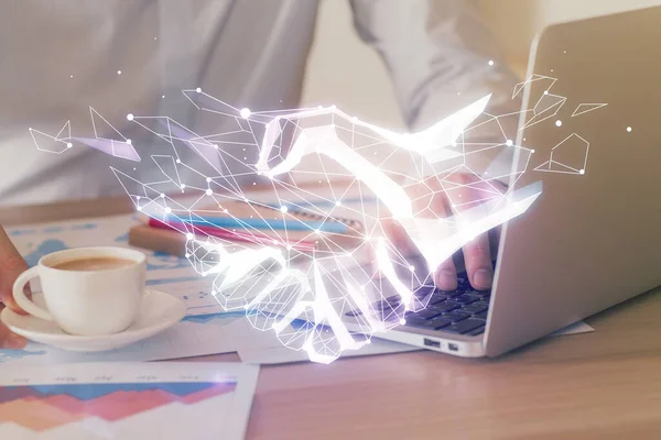 Handskakning hologram ritning med affärsman som arbetar på datorn på bakgrunden. Dubbel exponering. — Stockfoto