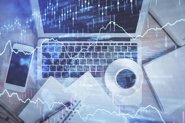 Stock market chart and top view computer on the table background. Double exposure. Concept of financial analysis. — Stock Photo, Image