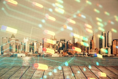 Veri temalı hologram gökdelenlerin arka planında çift pozlama ile şehir görünümüne çizim yapıyor. Teknoloji konsepti.