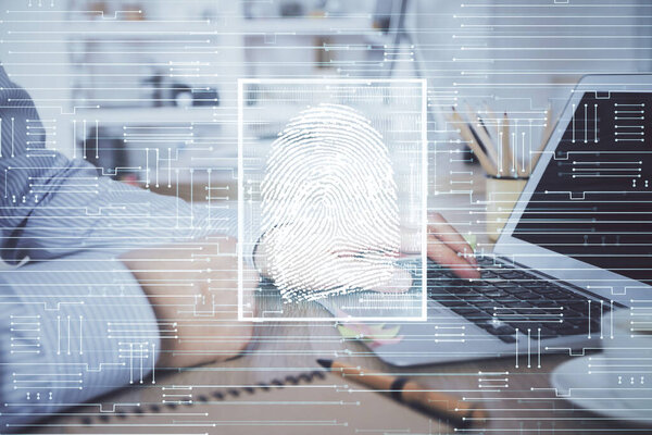 Fingerprint hologram with businessman working on computer on background. Security concept. Double exposure.