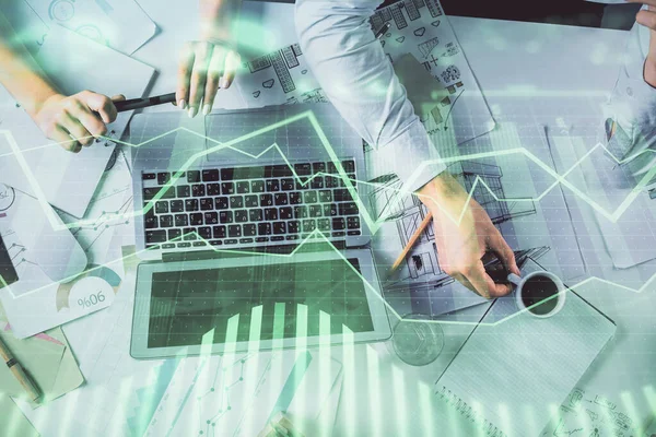 Doble exposición del hombre y la mujer trabajando juntos y holograma gráfico financiero. Concepto de negocio. Fondo informático. —  Fotos de Stock