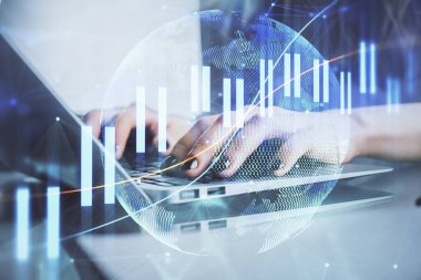 Bilgisayarda ve ön x grafik hologram çiziminde kadın eli yazarken çift pozlama. Borsa yatırım kavramı.