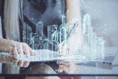 Not defterine el yazısının üzerini çiziyor. Akıllı ev kavramı. Çoklu pozlama