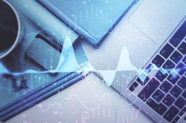Bilgisayarla masaüstü arkaplanı üzerinde ön x grafik çizimi çift pozlama. Finansal analiz kavramı. Üst görünüm.