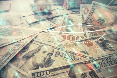 Forx grafiğinin çok sayıda görüntüsü bize dolar banknotları arka planında görünüyor. Finansal başarı piyasası kavramı.