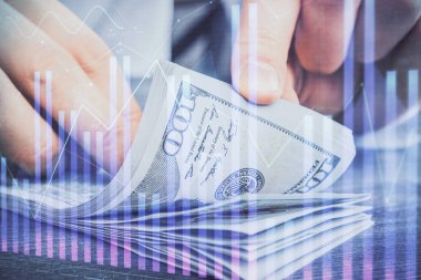 Forx grafiği, hologram, Amerikan dolarları ve insan eli çizimleri. Teknik Analiz kavramı.