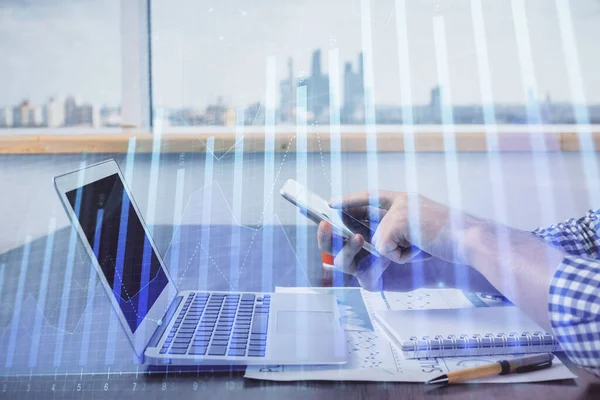 Double exposure of mans hands holding and using a digital device and forex graph drawing. Financial market concept. — Stock Photo, Image