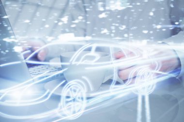 İş adamının arka planda bilgisayar üzerinde çalıştığı otomobil temalı çizim. Otomatik pilot taksi kavramı. Çift pozlama.