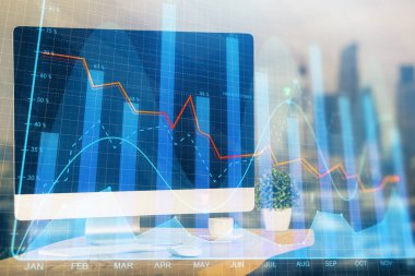 Finansal grafik renkli çizimler ve arka planda bilgisayar olan tablolar. Çoklu maruz kalma. Uluslararası pazarlar kavramı.