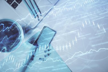Bilgisayarla masaüstü arkaplanı üzerinde ön x grafik çizimi çift pozlama. Finansal analiz kavramı. Üst görünüm.
