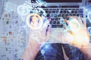 Dizüstü bilgisayar klavyesini ve ön x çizim hologramını yazarken çift pozlama. Üst Manzara. Finans piyasası kavramı.