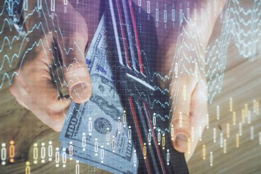 Forx grafiği, hologram, Amerikan dolarları ve insan eli çizimleri. Teknik Analiz kavramı.