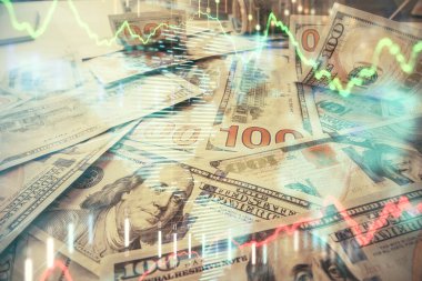 Forx grafiğinin çok sayıda görüntüsü bize dolar banknotları arka planında görünüyor. Finansal başarı piyasası kavramı.