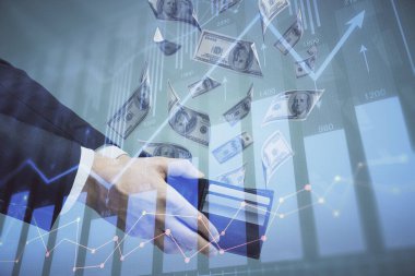 Finansal grafiğe çoklu pozlama hologram, Amerikan dolarları ve insan eli. Analiz kavramı.