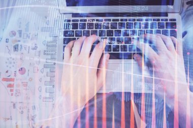 Dizüstü bilgisayar klavyesini ve ön x çizim hologramını yazarken çift pozlama. Üst Manzara. Finans piyasası kavramı.