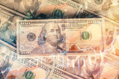 Forx grafiğinin çok sayıda görüntüsü bize dolar banknotları arka planında görünüyor. Finansal başarı piyasası kavramı.