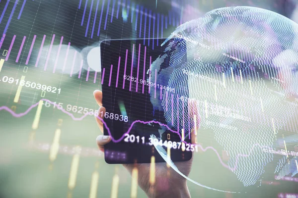 Double exposure of forex chart sketch hologram and woman holding and using a mobile device. Financial market concept.