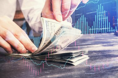 Forx grafiği, hologram, Amerikan dolarları ve insan eli çizimleri. Teknik Analiz kavramı.