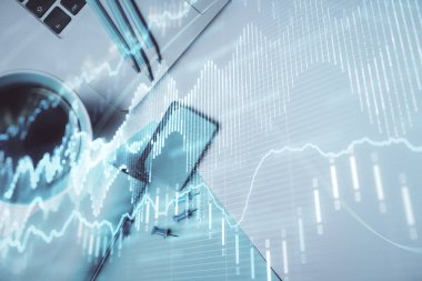 Bilgisayarla masaüstü arkaplanı üzerinde ön x grafik çizimi çift pozlama. Finansal analiz kavramı. Üst görünüm.