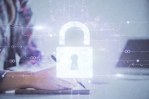 Double exposure of hands making notes with lock icons. Concept security and protection of data