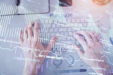 Dizüstü bilgisayar klavyesini ve ön x çizim hologramını yazarken çift pozlama. Üst Manzara. Finans piyasası kavramı.