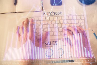 Dizüstü bilgisayar klavyesini ve ön x çizim hologramını yazarken çift pozlama. Üst Manzara. Finans piyasası kavramı.