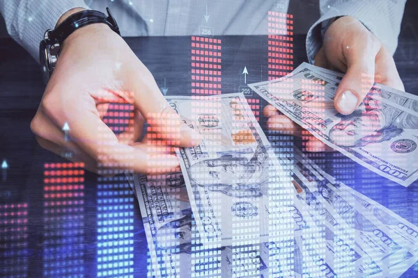 Multi blootstelling van de financiële grafiek tekenen hologram en Amerikaanse dollars rekeningen en man handen. Analyse concept. — Stockfoto