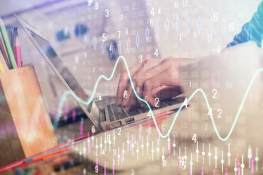 Bilgisayarda ve ön x grafik hologram çiziminde kadın eli yazarken çift pozlama. Borsa yatırım kavramı.