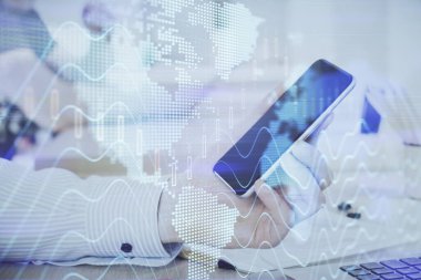 Bir adamın elini tutarken ve dijital bir cihaz ve ön grafik çizimi kullanırken çift pozlama. Finansal piyasa kavramı.