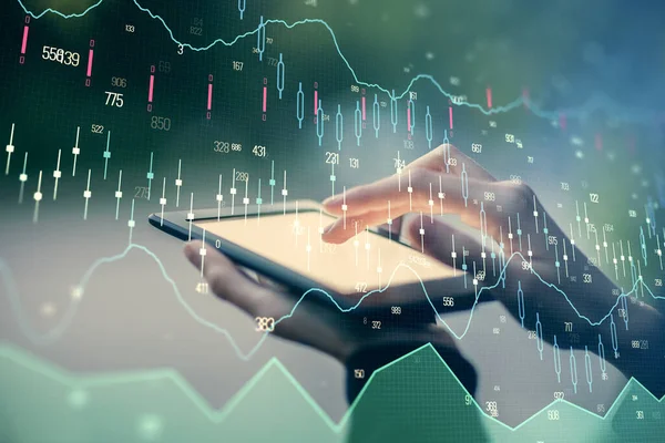 Double exposure of forex chart sketch hologram and woman holding and using a mobile device. Financial market concept.