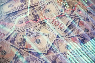 Forx grafiğinin çok sayıda görüntüsü bize dolar banknotları arka planında görünüyor. Finansal başarı piyasası kavramı.