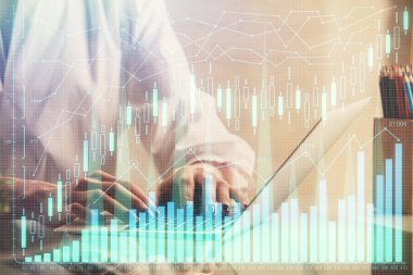Bilgisayarda ve ön x grafik hologram çiziminde kadın eli yazarken çift pozlama. Borsa yatırım kavramı.