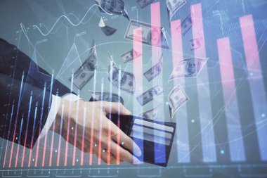 Finansal grafiğe çoklu pozlama hologram, Amerikan dolarları ve insan eli. Analiz kavramı.