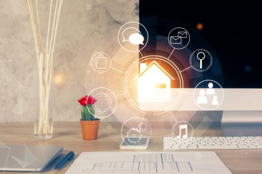 Ofisteki masaüstü bilgisayar geçmişi ve büyük kasaba binaları hologram çizimi. Çifte maruziyet. Akıllı şehir konsepti.