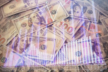 Forx grafiğinin çok sayıda görüntüsü bize dolar banknotları arka planında görünüyor. Finansal başarı piyasası kavramı.