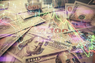 Forx grafiğinin çok sayıda görüntüsü bize dolar banknotları arka planında görünüyor. Finansal başarı piyasası kavramı.