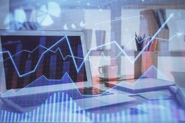 Arka planda eski pazar grafik hologramı ve kişisel bilgisayar var. Çoklu maruz kalma. Yatırım kavramı.