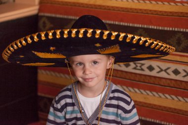 Sombrero giymiş bir çocuğun portresi. 