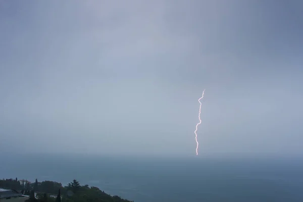 sea landscape with a thunderstorm sea and lightning
