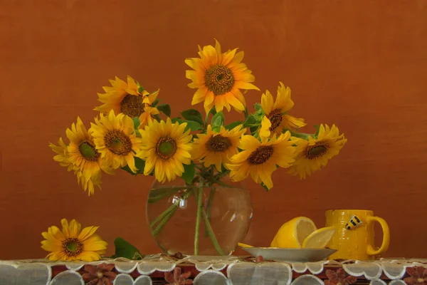 Still life with a bouquet of sunflowers in a vase