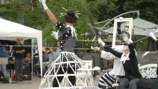 Theater troupe shows a street performance pantomime — Stock Video