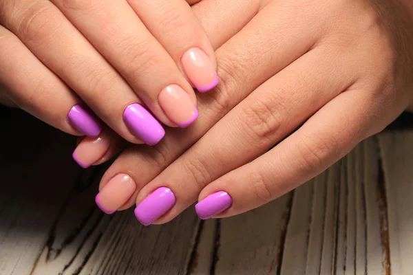Amazing natural nails. Women\'s hands with clean manicure.