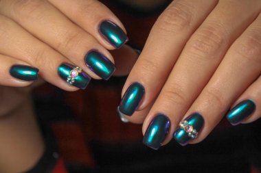 Manikürlü tırnak cilası sanat tasarımı. Tırnak cilası. Güzel eller..