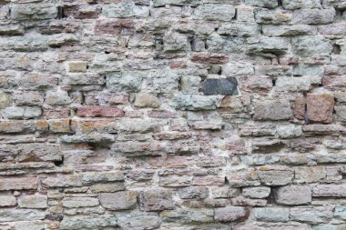 Tuğla, güzel bir duvar. İlginç taş arka plan.