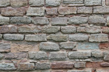 Tuğla, güzel bir duvar. İlginç taş arka plan.