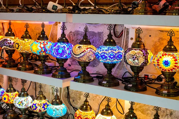 Gift shop with a variety of Turkish lamps for sale. The background is blurred, out of focus. Kotor, Montenegro