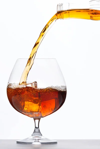 Pouring Whiskey Drink Glass Ice Cubes White Background Royalty Free Stock Photos