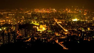 Hong Kong gece hava görüntüsü. 4K çözünürlük zaman aşımı. Ekim 2015.