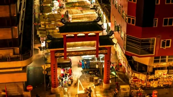 HONG KONG - Vista aérea de la calle del mercado nocturno. Tiempo de inclinación de lapso . — Vídeos de Stock